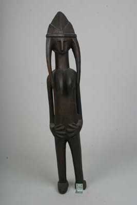 Bambara. (statue), d`afrique : Mali., statuette Bambara. (statue), masque ancien africain Bambara. (statue), art du Mali. - Art Africain, collection privées Belgique. Statue africaine de la tribu des Bambara. (statue), provenant du Mali., 180/717.Statue féminine debout représentant la reine des Bambara Guandoudou. H.102cm. Elle a une coiffe royale et deux tresses, les mains posés sur le ventre,symbole de fertilité.Elles étaient utilisés durant les cérémonies annuelles de le société Guan.Milieu du 20eme sc(Oumar sylla). art,culture,masque,statue,statuette,pot,ivoire,exposition,expo,masque original,masques,statues,statuettes,pots,expositions,expo,masques originaux,collectionneur d`art,art africain,culture africaine,masque africain,statue africaine,statuette africaine,pot africain,ivoire africain,exposition africain,expo africain,masque origina africainl,masques africains,statues africaines,statuettes africaines,pots africains,expositions africaines,expo africaines,masques originaux  africains,collectionneur d`art africain