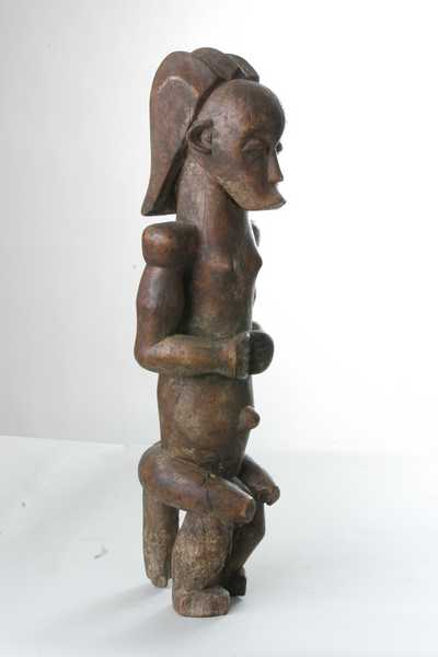 Fang (statue) , d`afrique : Gabon, statuette Fang (statue) , masque ancien africain Fang (statue) , art du Gabon - Art Africain, collection privées Belgique. Statue africaine de la tribu des Fang (statue) , provenant du Gabon, 688/34 Ancienne et très belle statue Fang  statue MVAI reconnaissables à leur coiffure casque-perruque divisée en trois crêtes triangulaires distinctes;fin 19eme, début 20eme sc.;h.63cm.bois à patine brune.(pères blancs). art,culture,masque,statue,statuette,pot,ivoire,exposition,expo,masque original,masques,statues,statuettes,pots,expositions,expo,masques originaux,collectionneur d`art,art africain,culture africaine,masque africain,statue africaine,statuette africaine,pot africain,ivoire africain,exposition africain,expo africain,masque origina africainl,masques africains,statues africaines,statuettes africaines,pots africains,expositions africaines,expo africaines,masques originaux  africains,collectionneur d`art africain